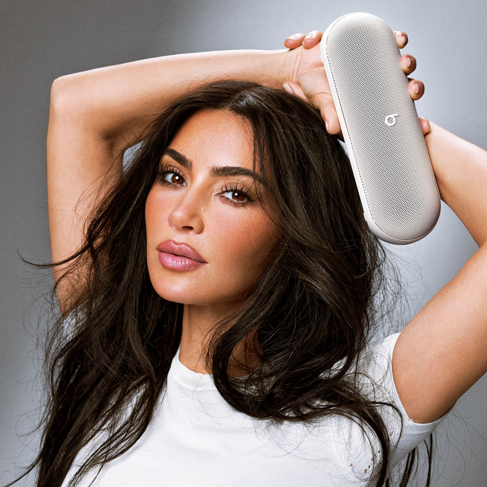 Kim Kardashian holding Beats Pill in Light Gray